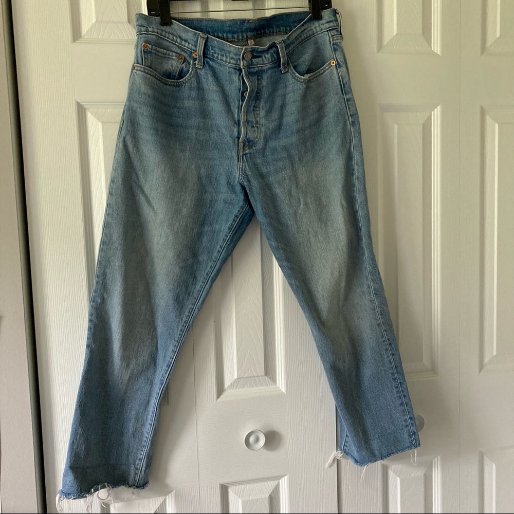 High Waist Button Fly Levi’s with Raw Hem
